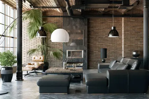 Nowoczesny salon w stylu industrialnym z ceglaną ścianą, czarną skórzaną kanapą, fotelem i drewnianym stolikiem kawowym.